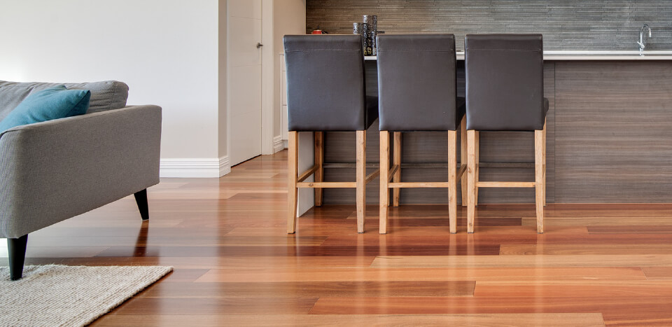 furnitures placed on top of a finely crafted wooden flooring