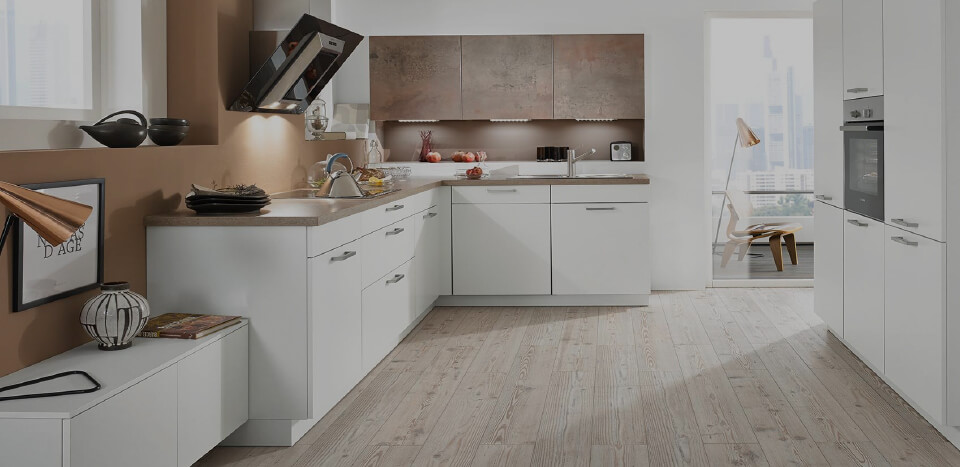 Elegant white interior kitchen with wooden flooring